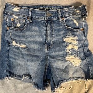 Ripped blue jean shorts